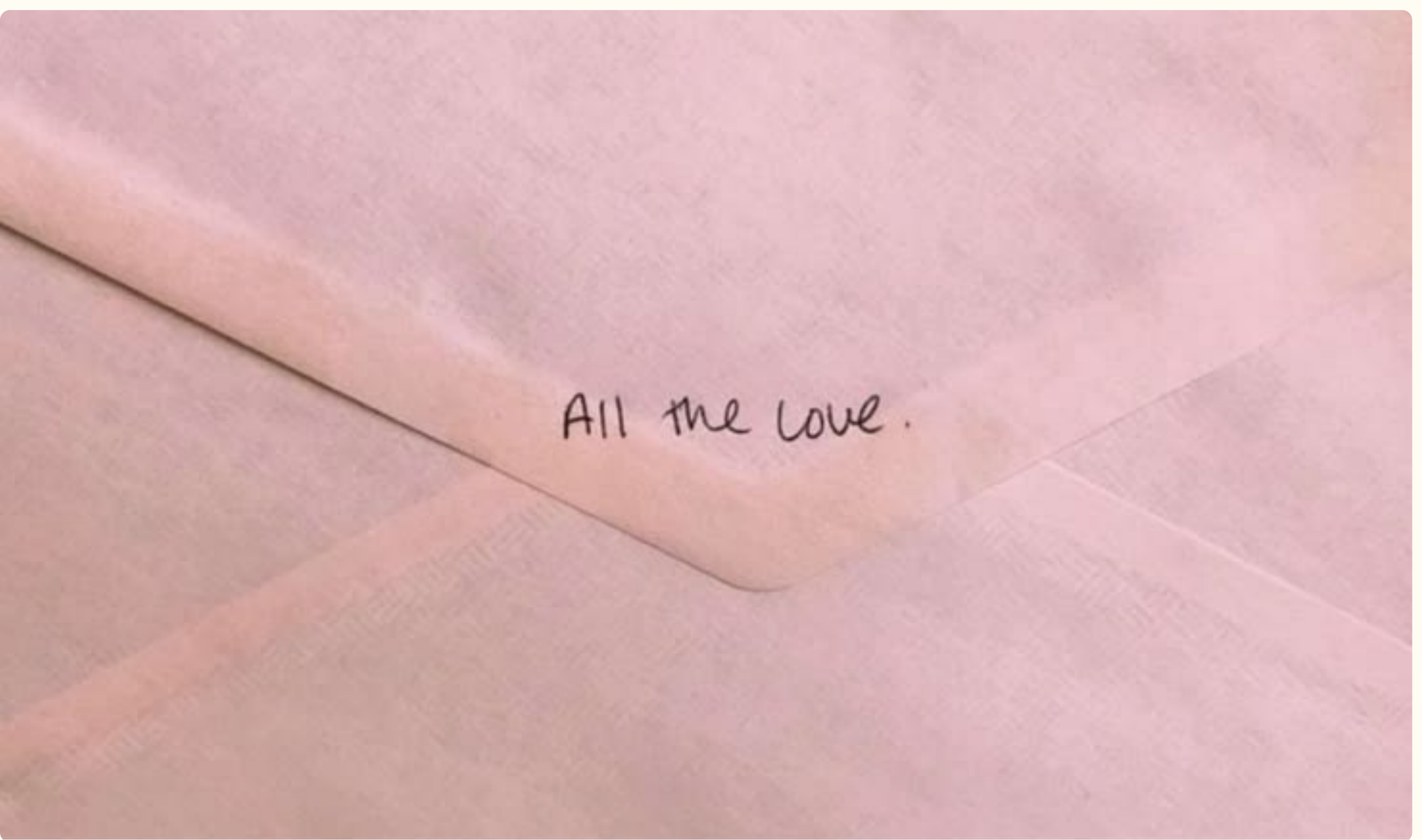 Pink envelope reading All the love